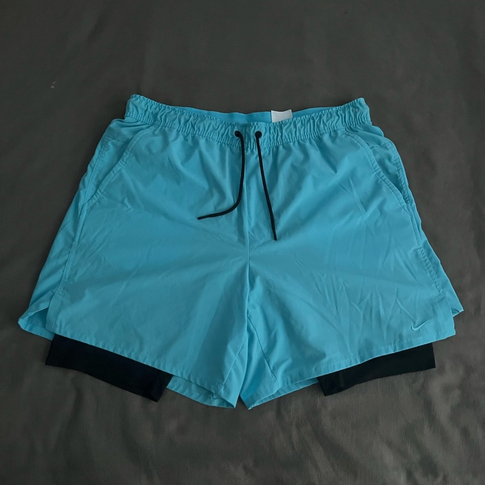 ￼ Nike men’s dry fit shorts with built-in compression ￼